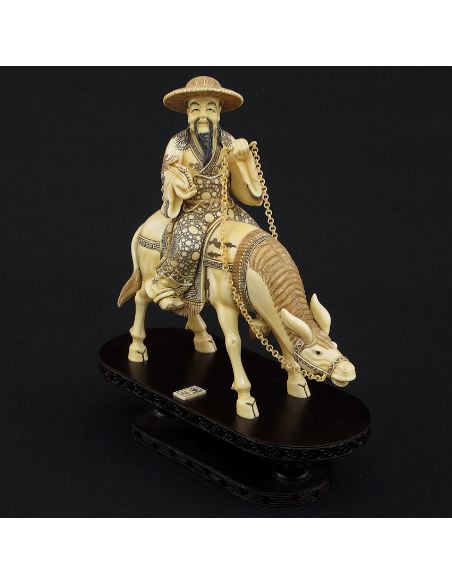 Sculpture sur ivoire: Toba sur sa mule (esab01802/07i)
