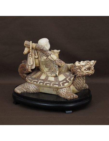 Figura de Hueso Buda sobre tortuga dragón 27cm con peana